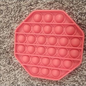 Source Unknown Red Octagon Pop It Toy